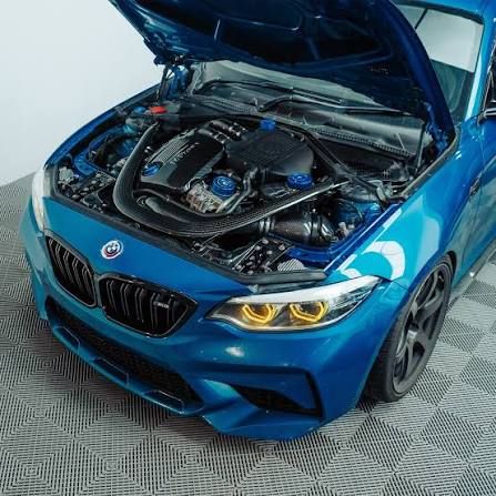 BMW M engine bay with aftermarket intake